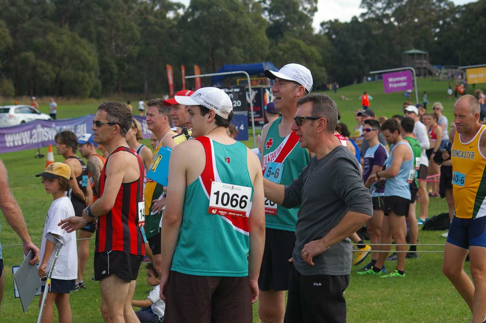 Tom, Travis and John looking on as the lead runners complete their first lap.